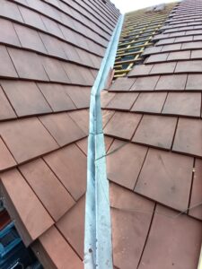 Rénovation de toiture avec des tuiles de Beauvoise rouge flammée à Crécy sur Serre